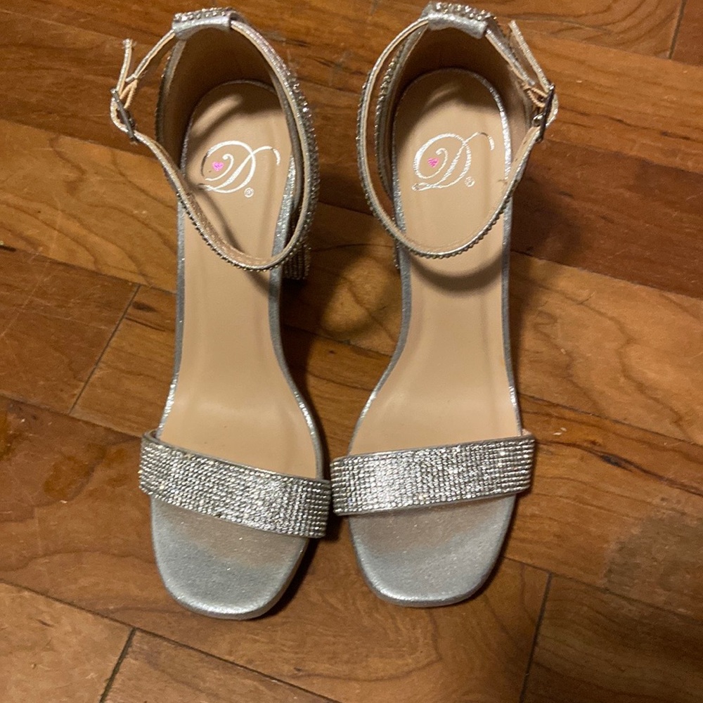 Silver heels. Size 6.
